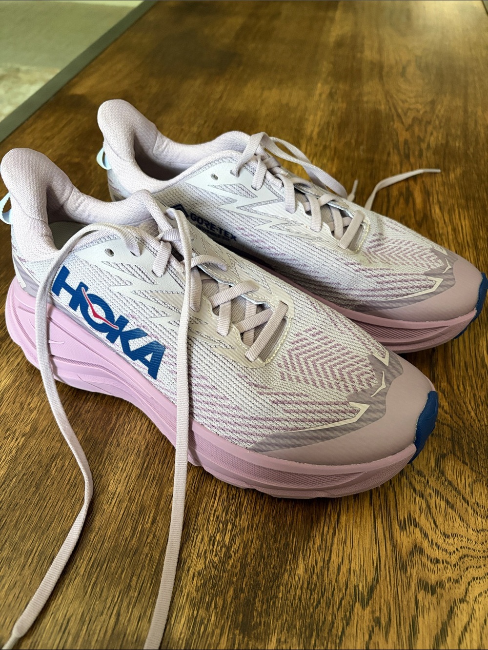 HOKA Women's Pink and Lavender Athletic Running Shoes with Blue Logo